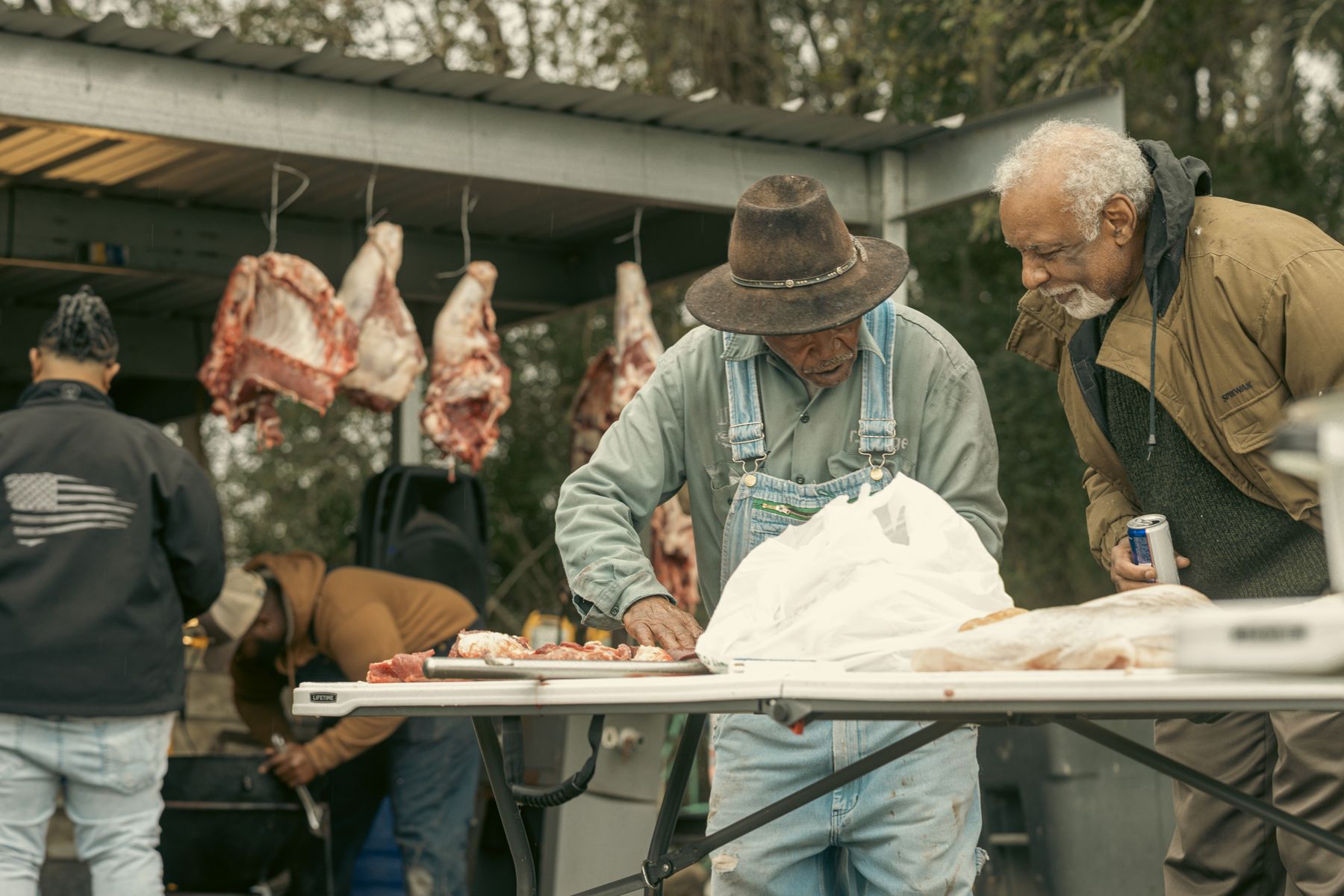 Elders working the table at the Boagni boucherie