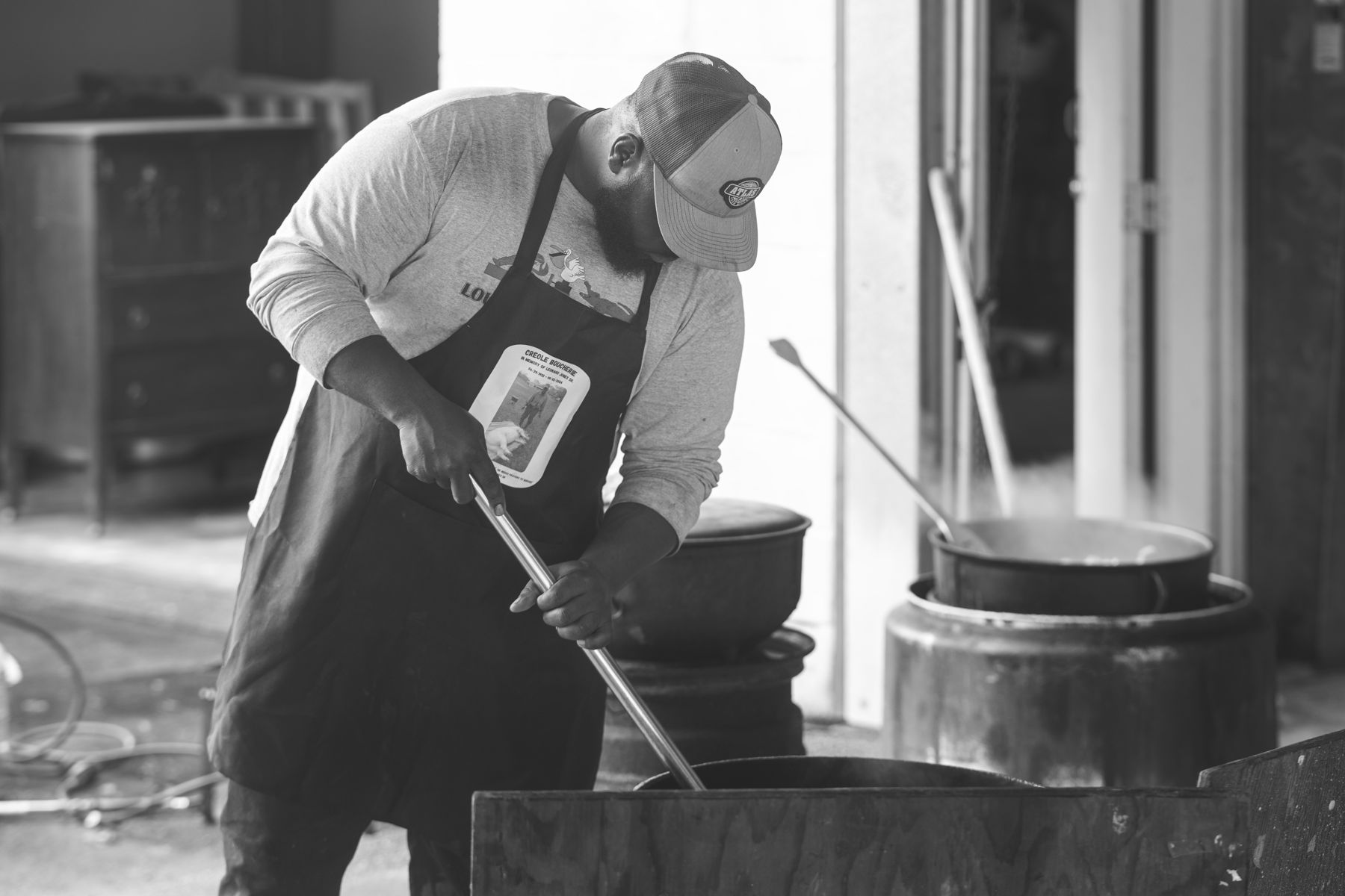 Jocorey Houston stirring cracklins